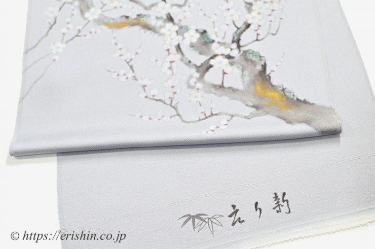 呉服えり新オリジナル染名古屋帯（若冲梅花晧月図写し/相思鼠色）のロゴ