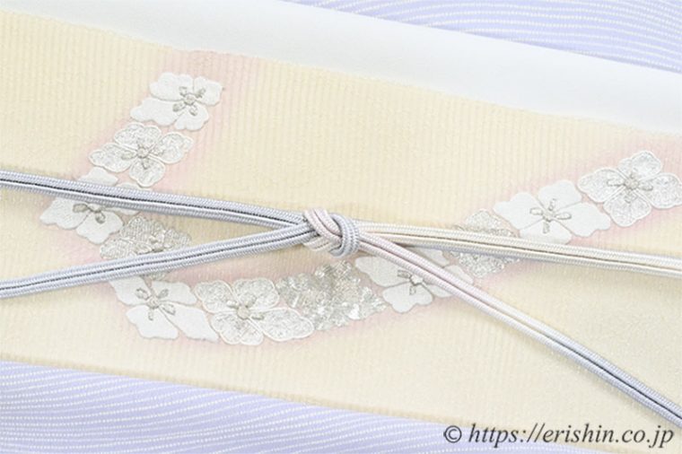 小紋（波の縞/淡藤色）に九寸織名古屋帯（たすき花菱）