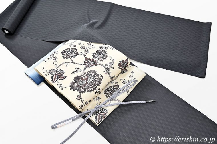 明石縮（よろけ小格子無地/墨黒）に染名古屋帯（大花更紗/生紬）