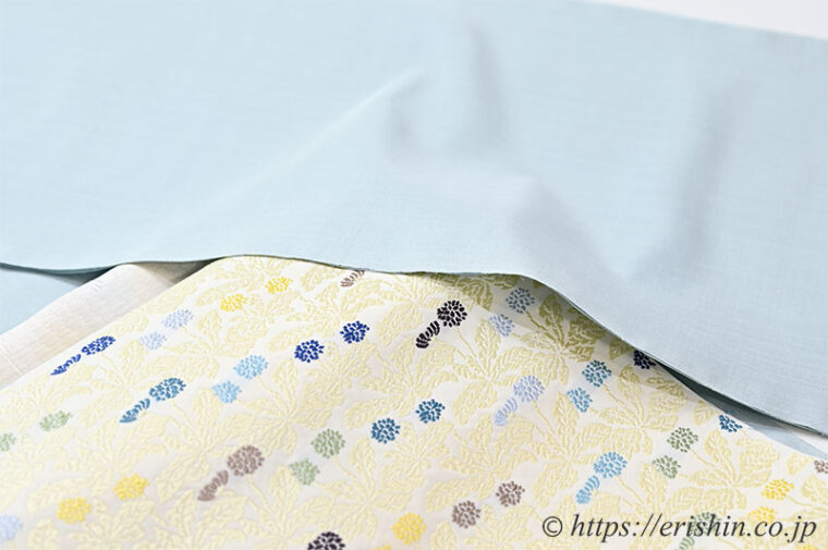 旬のお勧めコーディネート「芝崎圭一 座繰り紬無地に勝山さと子 蒲公英の名古屋帯」