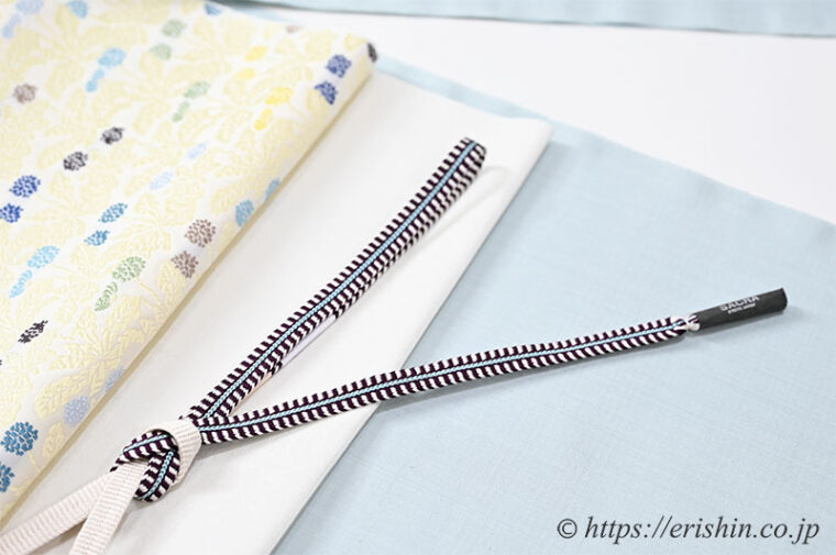 旬のお勧めコーディネート「芝崎圭一 座繰り紬無地に勝山さと子 蒲公英の名古屋帯」