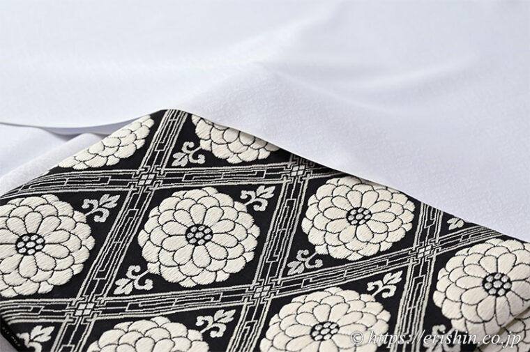 旬のお勧めコーディネート「小葵七宝文の色無地に黒地の菊華菱紋の袋帯」