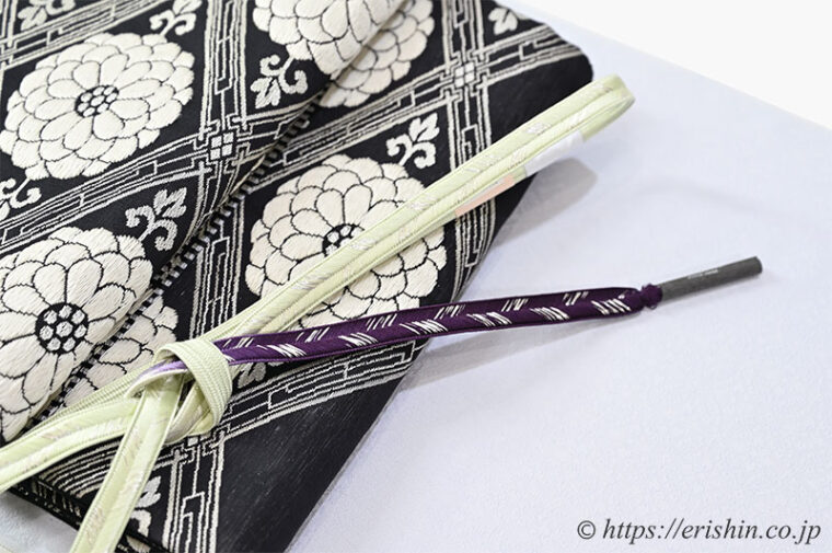 旬のお勧めコーディネート「小葵七宝文の色無地に黒地の菊華菱紋の袋帯」
