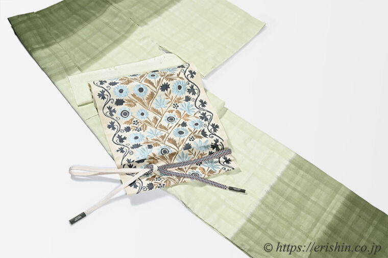 旬のお勧めコーディネート「紬地の熨斗目訪問着に洛風林のウクライナ縫花文名古屋帯」