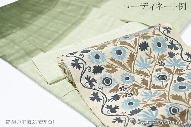 旬のお勧めコーディネート「紬地の熨斗目訪問着に洛風林のウクライナ縫花文名古屋帯」　帯揚げは「有職文/若芽色」