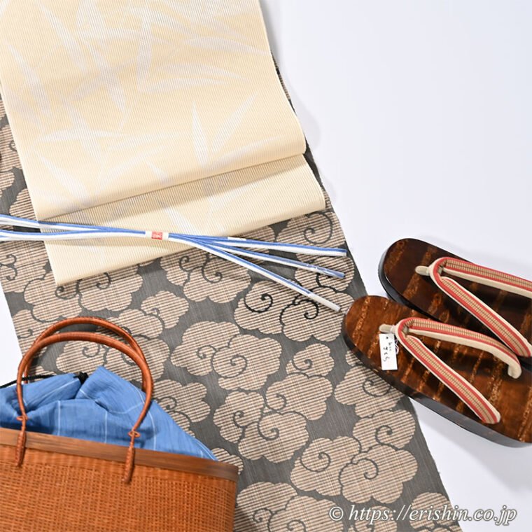 旬のお勧めコーディネート「竺仙 松煙染小紋（雲珠文）に 竪絽の八寸名古屋帯（笹）」