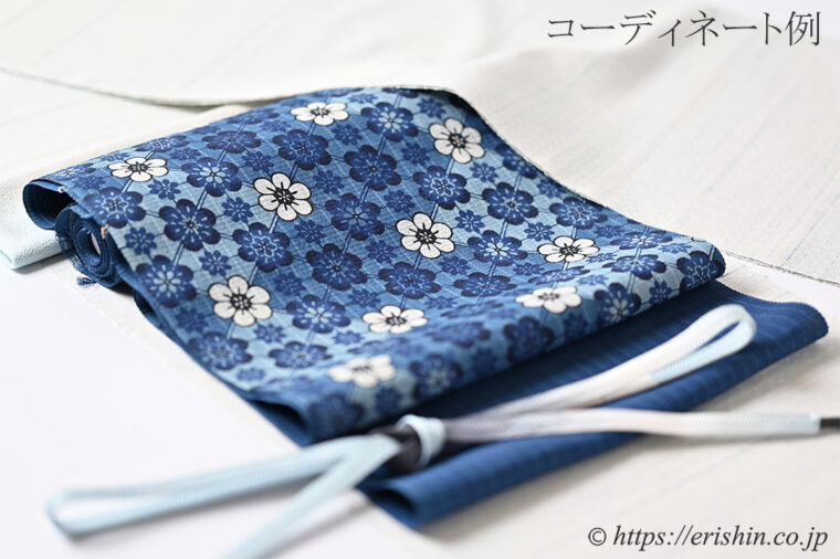 城間栄市　琉球本紅型 九寸染名古屋帯（小花づくし/藍型・松煙染）