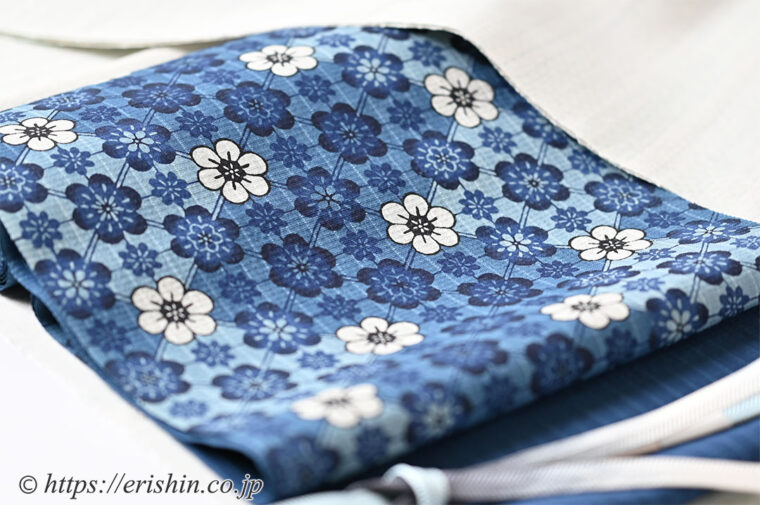 城間栄市　琉球本紅型 九寸染名古屋帯（小花づくし/藍型・松煙染）