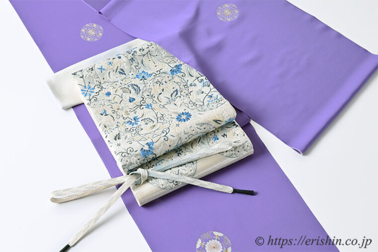 旬のお勧めコーディネート「レセプションに　蝶華紋の紫苑色の付下に銀彩の袋帯」