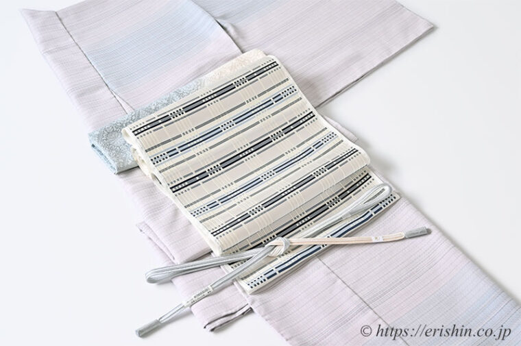 旬のお勧めコーディネート「下井伸彦さんの絵羽調着物に啓さんの名古屋帯を」