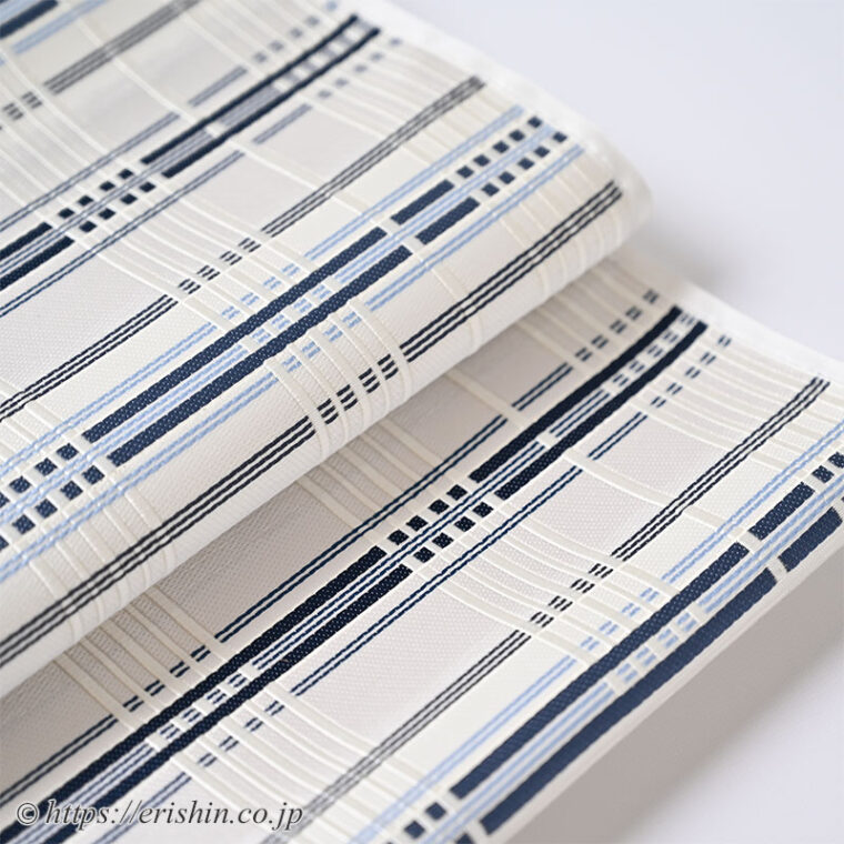 美術工芸 啓 　九寸織名古屋帯（錦熨斗目/深縹色を中心に水色を添えて）