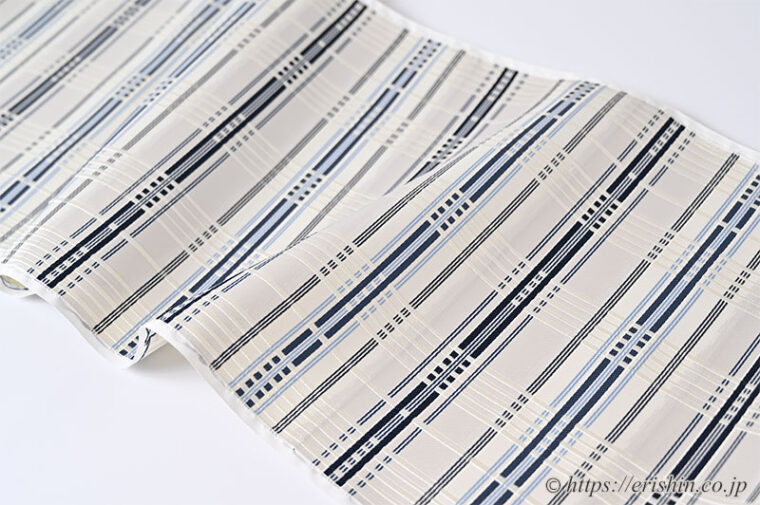 美術工芸 啓　九寸織名古屋帯（錦熨斗目/深縹色を中心に水色を添えて）