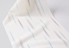 明石縮（乱れ絣楝色×緑青色）「着物と帯・呉服えり新」